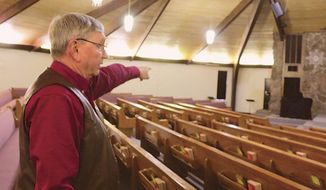 In this Dec. 27, 2019 photo, Bart Bartels, who leads the security team at Northfield Church in Gering, Neb., talks about how members of the church&#x27;s security team. The shooting at a Texas church in which two armed congregants fatally shot a gunman who had killed two people during church services Sunday highlighted a juxtaposition religious leaders have been struggling with in recent years. Churches are sanctuaries, places where a message of peace and understanding guide the mission. However, in a modern world, more churches are weighing the heavy burden of “protecting its flocks,” in the words of security leaders at Scottsbluff and Gering churches.  (Maunette Loeks/The Star-Herald via AP)