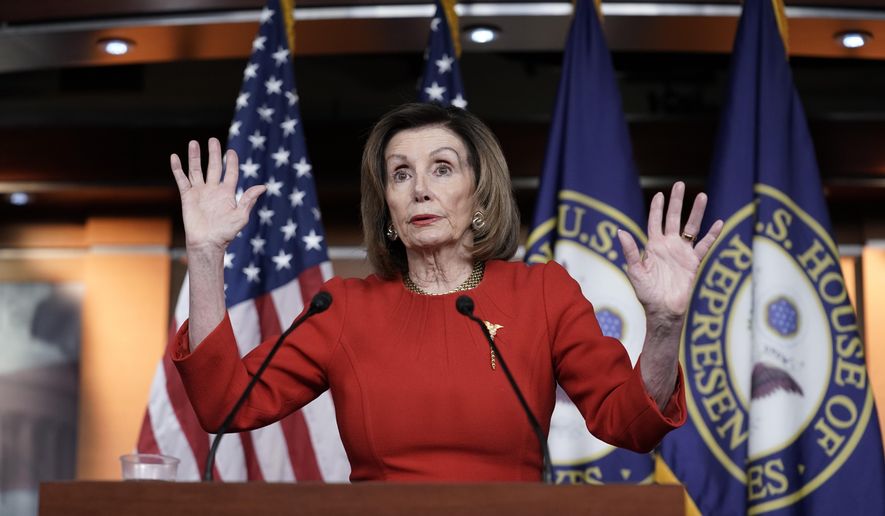 House Speaker Nancy Pelosi, D-Calif., meets with reporters at the Capitol in Washington, Thursday, Dec. 19, 2019, on the day after the House of Representatives voted to impeach President Donald Trump on two charges, abuse of power and obstruction of Congress. (AP Photo/J. Scott Applewhite) ** FILE **