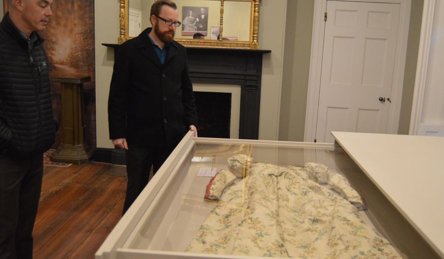 This recent photo shows an 1845 dress worn by diarist Mary Boykin Chesnut, whose chronicle of Southern life during the Civil War is considered one of the most important works of Confederate literature,. The dress is among the pieces on display at the Robert Mills House, maintained by Historic Columbia in Columbia, S.C. (Adam Benson/The Post And Courier via AP)