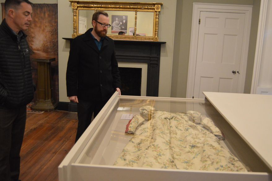 This recent photo shows an 1845 dress worn by diarist Mary Boykin Chesnut, whose chronicle of Southern life during the Civil War is considered one of the most important works of Confederate literature,. The dress is among the pieces on display at the Robert Mills House, maintained by Historic Columbia in Columbia, S.C. (Adam Benson/The Post And Courier via AP)