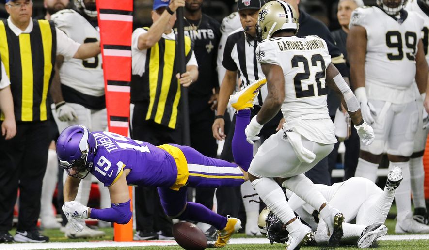 Minnesota Vikings wide receiver Adam Thielen (19) fumble on a pass reception which was recovered by the New Orleans Saints in the first half of an NFL wild-card playoff football game, Sunday, Jan. 5, 2020, in New Orleans. (AP Photo/Brett Duke)