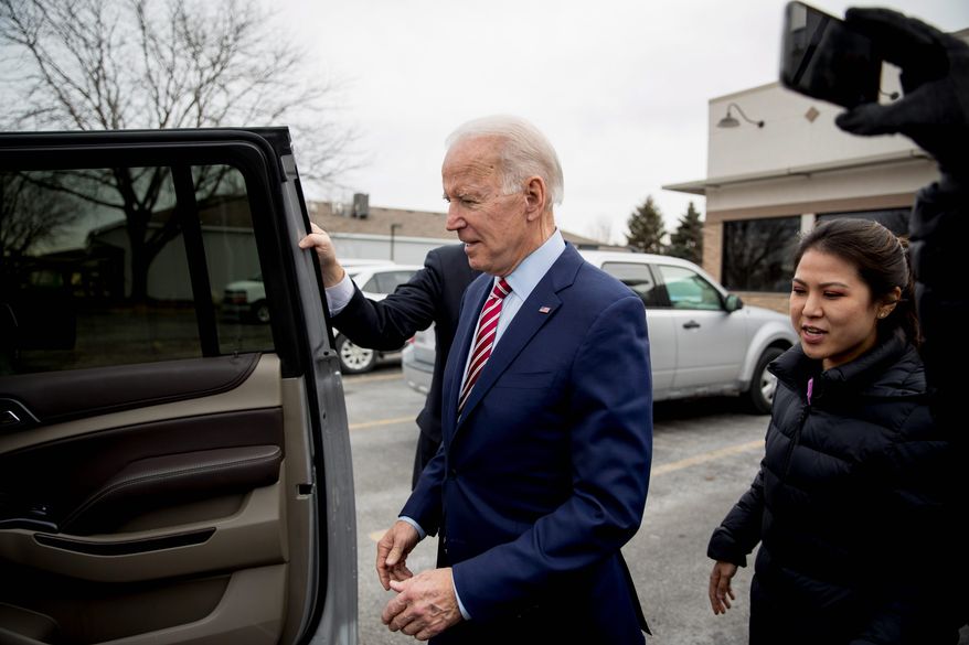 Democratic presidential candidate Joe Biden leaves after eating lunch at Ross' Restaurant, Monday, Jan. 6, 2020, in Bettendorf, Iowa. (AP Photo/Andrew Harnik)