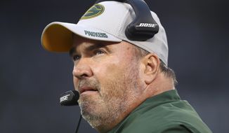 FILE - In this Aug. 24, 2018, file photo, Green Bay Packers head coach Mike McCarthy watches during the first half of an NFL preseason football game against the Oakland Raiders, in Oakland, Calif. The Dallas Cowboys didn&#39;t take long to settle on Mike McCarthy as their coach after waiting a week to announce they were moving on from Jason Garrett. McCarthy, who won a Super Bowl at the home of the Cowboys nine years ago as Green Bay&#39;s coach, has agreed to become the ninth coach in team history, a person with direct knowledge of the deal said Monday, Jan. 6, 2020. The person spoke to The Associated Press on condition of anonymity because the team hasn&#39;t announced the move. (AP Photo/Ben Margot, File)