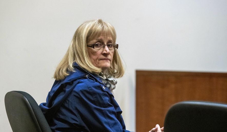 Barbara Chance, mother of Jared Chance, who was found guilty in the 2018 slaying and dismemberment of Ashley Young, appears at the Kent County Courthouse in Grand Rapids, Mich., on Monday, Jan. 6, 2020. She pleaded no contest to charges that she lied to police and helped her son cover up the murder of Young. (Cory Morse/The Grand Rapids Press via AP)