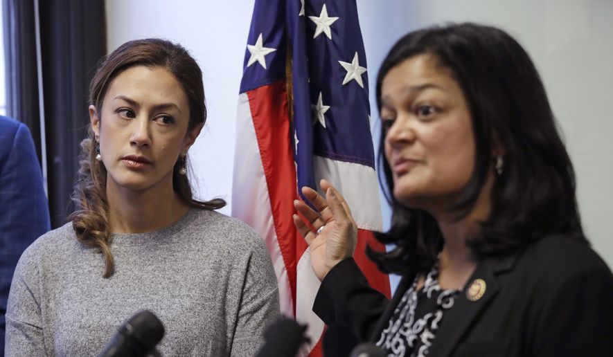 Negah Hekmati, left, looks on as Rep. Pramila Jayapal, D-Wash., addresses a news conference about Hekmati's ordeal during an hours-long delay returning to the U.S. from Canada with her family days earlier, Monday, Jan. 6, 2020, in Seattle. Civil rights groups and lawmakers were demanding information from federal officials following reports that dozens of Iranian-Americans were held up and questioned at the border as they returned to the United States from Canada over the weekend. In a statement Sunday, the Washington state chapter of the Council on American-Islamic Relations said more than 60 Iranians and Iranian-Americans were detained and questioned at the Peace Arch Border Crossing in Blaine, Washington. (AP Photo/Elaine Thompson)