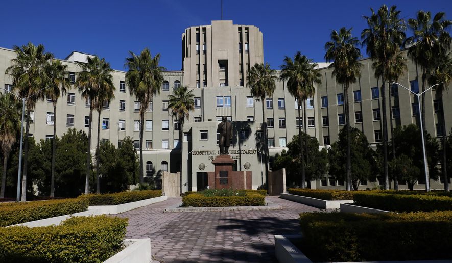 A view of the University Hospital in Monterrey, Nuevo Leon state, Mexico, Monday, Jan. 6, 2020, where the survivors of an attack on a family in a car with Oklahoma license plates are being treated. Mexican authorities continued searching Monday for the gunmen responsible for an attack on a sparsely traveled stretch of highway near the Texas border that left a 13-year-old U.S. citizen dead and four relatives wounded. (AP Photo/Antonio Escobar)