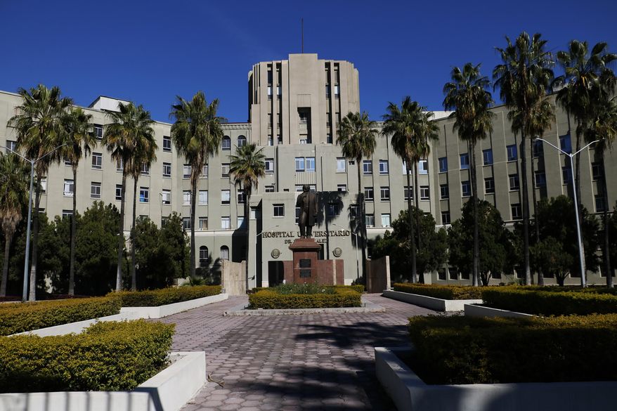 A view of the University Hospital in Monterrey, Nuevo Leon state, Mexico, Monday, Jan. 6, 2020, where the survivors of an attack on a family in a car with Oklahoma license plates are being treated. Mexican authorities continued searching Monday for the gunmen responsible for an attack on a sparsely traveled stretch of highway near the Texas border that left a 13-year-old U.S. citizen dead and four relatives wounded. (AP Photo/Antonio Escobar)