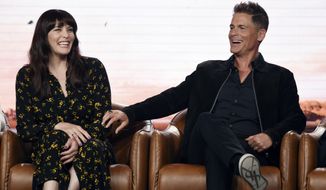 Rob Lowe, right, and Liv Tyler, cast members in the upcoming television series &amp;quot;9-1-1: Lone Star,&amp;quot; share a laugh during the 2020 FOX Television Critics Association Winter Press Tour, Tuesday, Jan. 7, 2020, in Pasadena, Calif. (AP Photo/Chris Pizzello)