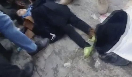 In this frame grab from video posted online, people try to resuscitate victims of a deadly stampede at a funeral procession for a top Iranian general killed in a U.S. airstrike last week, in Kerman, Iran, Tuesday, Jan. 7, 2019. Two Iranian semi-official news agencies reported that the stampede in Kerman that killed dozens of people and injured over 200 others took place in Kerman, the hometown of Revolutionary Guard Gen. Qassem Soleimani, as the procession got underway. (AP Photo)