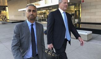 In this Nov. 22, 2019 file photo, Imaad Zuberi, left, leaves the federal courthouse with his attorney Thomas O&#39;Brien, right, in Los Angeles. Federal prosecutors on Tuesday, Jan. 7, 2020, charged Zuberi, a major donor to President Donald Trump&#39;s Inaugural Committee, with obstructing a federal investigation into whether foreign nationals unlawfully contributed to the inaugural celebrations. (AP Photo/Brian Melley, File)