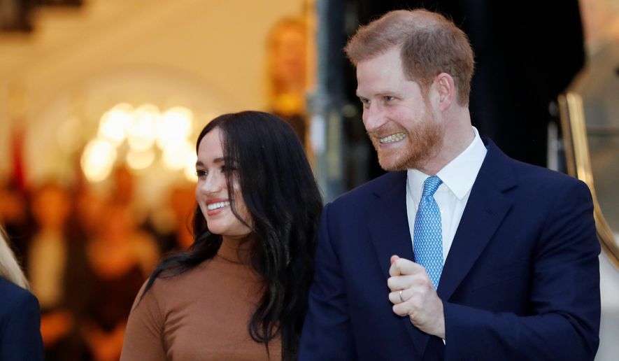 Britain&#39;s Prince Harry and Meghan, Duchess of Sussex leave after visiting Canada House in London after their recent stay in Canada. (AP Photo/Frank Augstein, FILE)