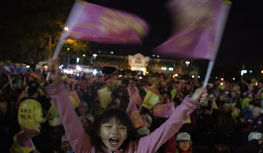 In this Wednesday, Jan. 8, 2020, photo, supporters of Tsai Ing-wen, Taiwan&#39;s President and the 2020 presidential election candidate for the Democratic Progressive Party (DPP), cheer during an election campaign rally in northern Taiwan&#39;s Hsinchu province. A year ago, the Taiwan leader was on the ropes. Now President Tsai appears poised to win a second four-year term in elections this Saturday. (AP Photo/Ng Han Guan)