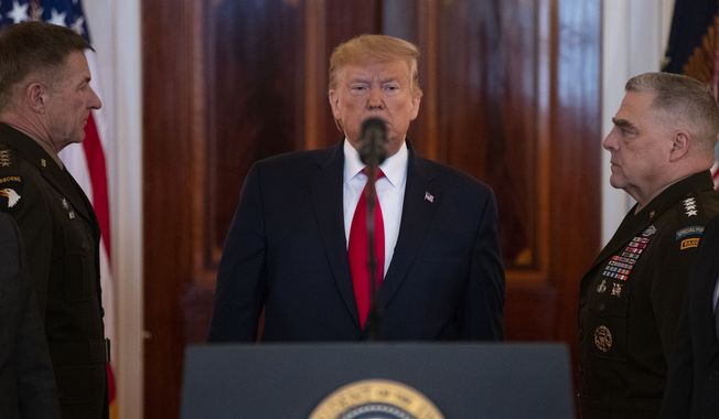 President Donald Trump arrives to address the nation from the White House on the ballistic missile strike that Iran launched against Iraqi air bases housing U.S. troops, Wednesday, Jan. 8, 2020, in Washington. (AP Photo/ Evan Vucci)