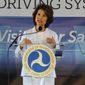 In this Sept. 12, 2017 file photo,  U.S. Transportation Secretary Elaine Chao announces new voluntary safety guidelines for self-driving cars during a visit to an autonomous vehicle testing facility at the University of Michigan, in Ann Arbor, Mich.  The Trump administration announced its most recent round of guidelines for autonomous vehicle makers, continuing to rely on the industry to police itself despite calls for specific regulations.  Chao announced the proposed guidelines in a speech Wednesday, Jan. 8, 2020 at the CES gadget show in Las Vegas, saying in prepared remarks that “AV 4.0” will ensure U.S. leadership in developing new technologies.(Hunter Dyke/The Ann Arbor News via AP, File)  **FILE**