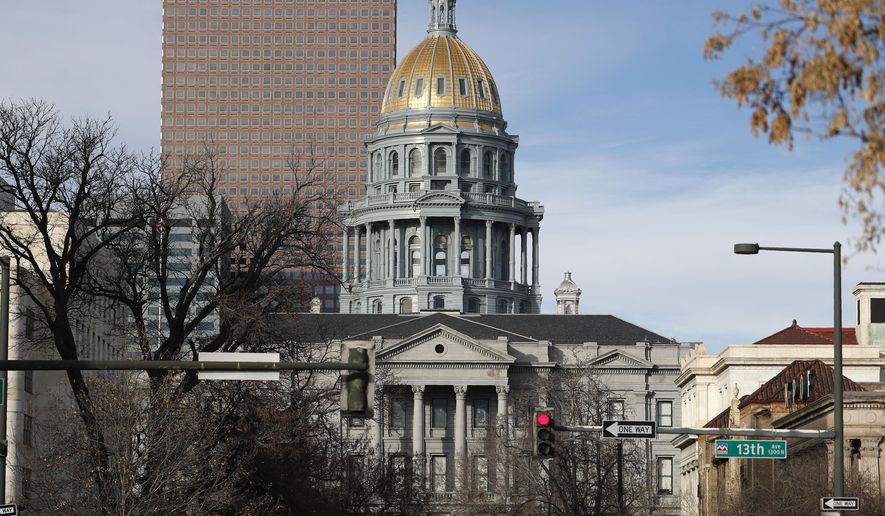 FILE - In this Saturday, Jan. 4, 2020, file photo, the State Capitol is shown in downtown Denver. Colorado's four-month legislative session starts Wednesday, Jan. 8, and majority Democrats want to build on legislation passed last year to extend health care coverage and lower prices. (AP Photo/David Zalubowski, File)