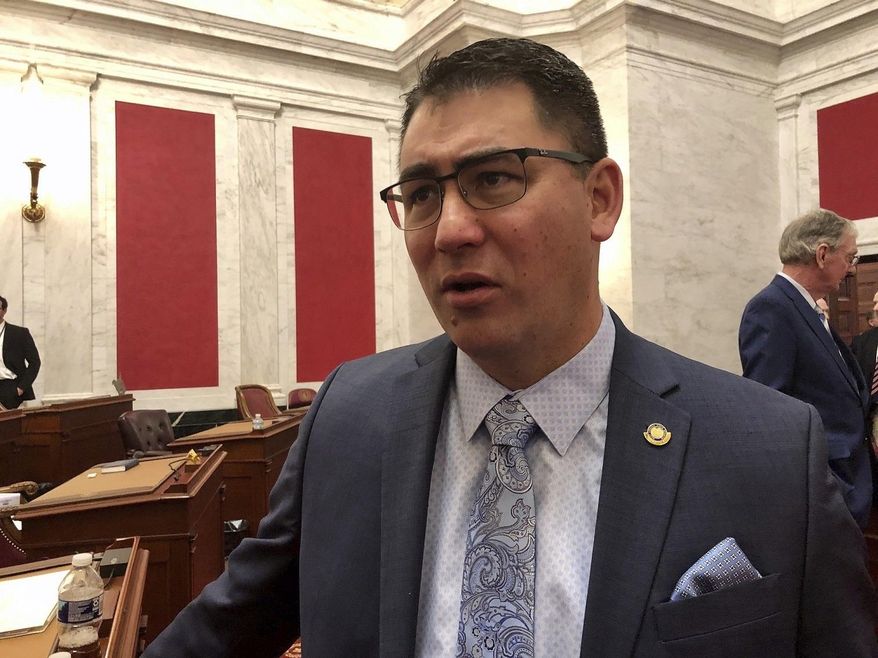 West Virginia Senate Majority Leader Tom Takubo, a Kanawha County Republican, listens to a colleague before the start of the 2020 regular legislative session Wednesday, Jan. 8, 2020, in Charleston, W.Va. Takubo was named to lead a Senate committee to focus on upcoming legislation related to the state’s ongoing foster care crisis and substance abuse epidemic. (AP Photo/John Raby)