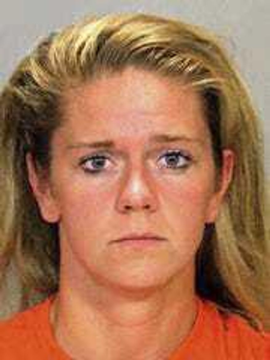 This booking photo released by the Black Hawk County Sheriff's Office shows Katherine Krieger, 25, the former police chief of Dunkerton, Iowa. Krieger pleaded guilty Monday, Jan. 6, 2020, to charges of theft and felonious misconduct in office. Both carry sentences of up to five years in prison. (Black Hawk County Sheriff's Office via AP)
