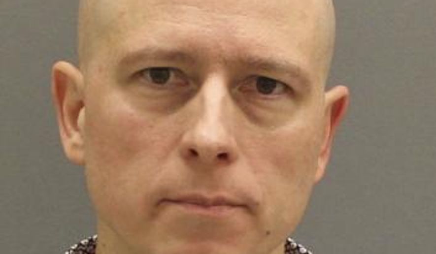 This image released by the Ottawa County Jail, shows Timothy Koets, 50, an assistant professor for Grand Rapids Community College, who has been charged in the pool drowning of his son with autism. Koets, who is scheduled to stand trial in March in the drowning of 16-year-old Samuel Koets, told nationally syndicated news magazine “Inside Edition” on Tuesday, Jan. 7, 2020, that he is being unfairly portrayed as an uncaring father who neglected to supervise his son. (Ottawa County Jail/The Grand Rapids Press via AP)