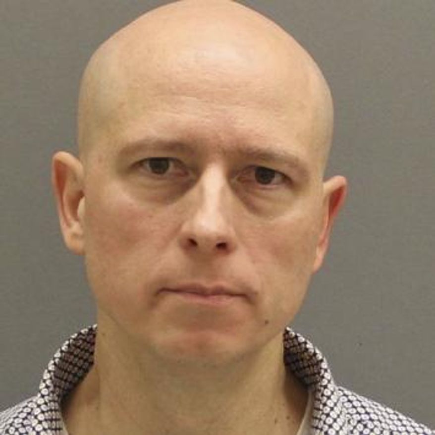 This image released by the Ottawa County Jail, shows Timothy Koets, 50, an assistant professor for Grand Rapids Community College, who has been charged in the pool drowning of his son with autism. Koets, who is scheduled to stand trial in March in the drowning of 16-year-old Samuel Koets, told nationally syndicated news magazine “Inside Edition” on Tuesday, Jan. 7, 2020, that he is being unfairly portrayed as an uncaring father who neglected to supervise his son. (Ottawa County Jail/The Grand Rapids Press via AP)