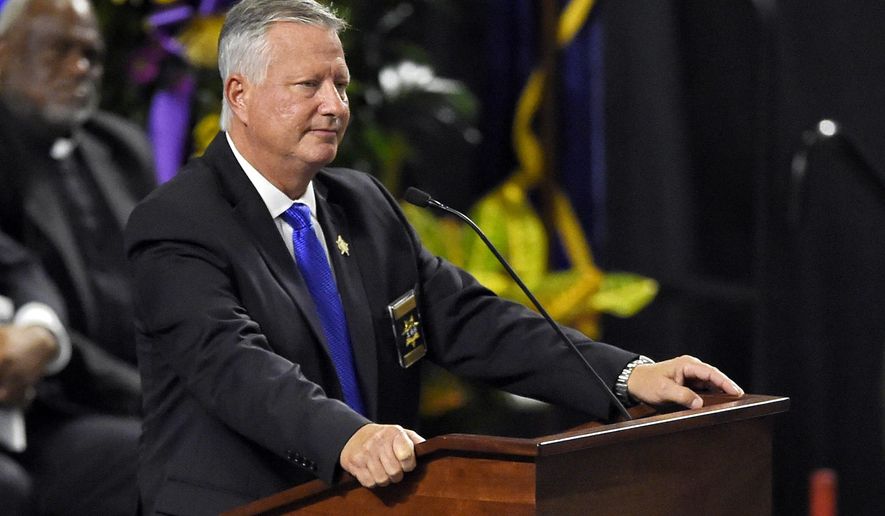 FILE - In this Oct. 28, 2018, file photo, Florence County Sheriff Kenney Boone speaks during a memorial service for fallen Florence County Sheriff investigator Farrah Turner at the Florence Center in Florence, S.C. Former Florence County Sheriff Kenney Boone pleaded guilty Wednesday, Jan. 8, 2020, to embezzlement and misconduct in office, according to the state attorney general's office. (AP Photo/Richard Shiro File)