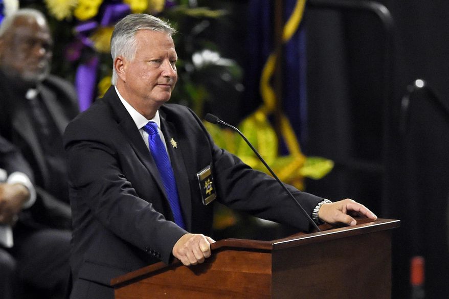 FILE - In this Oct. 28, 2018, file photo, Florence County Sheriff Kenney Boone speaks during a memorial service for fallen Florence County Sheriff investigator Farrah Turner at the Florence Center in Florence, S.C. Former Florence County Sheriff Kenney Boone pleaded guilty Wednesday, Jan. 8, 2020, to embezzlement and misconduct in office, according to the state attorney general's office. (AP Photo/Richard Shiro File)