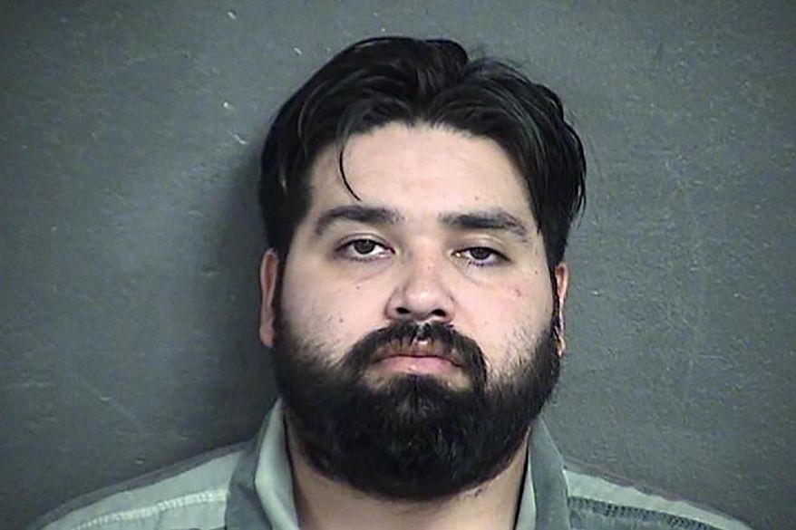 This undated photo provided by The Wyandott County Detention Center in Kansas City, Kan shows Ismael Caballero. Caballero has been charged in the deaths of his ex-girlfriend and two of her children whose bodies were found after a house fire in Kansas City, Kan. The charges stem from the discovery of the bodies of 32-year-old Yazmine Rodriguez-Santilla, 14-year-old Amerikha Rodriguez and 10-year-old Jean Carlos Rodriguez by crews battling a house fire early Monday, Dec. 30, 2019. (Wyandott County Detention Center via AP)