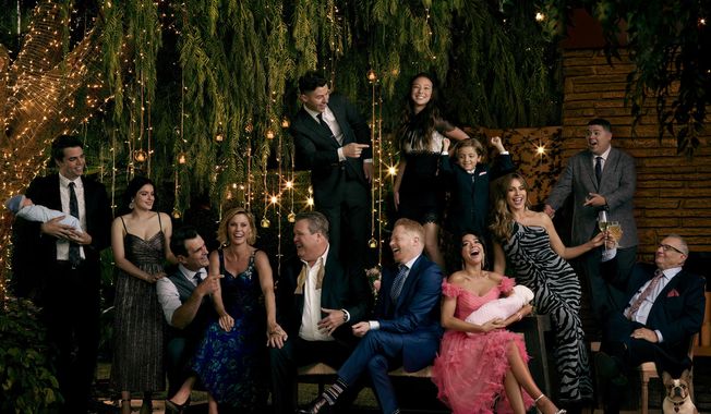 This image released by ABC shows the cast of the ABC sitcom &amp;quot;Modern Family,&amp;quot; from left, Reid Ewing, Ariel Winter, Ty Burrell Julie Bowen, Eric Stonestreet, Nolan Gould, standing left center, Jesse Tyler Ferguson, Aubrey Anderson-Emmons, standing center right, Jeremy Maguire, Sarah Hyland, seated holding baby, Sofía Vergara, Rico Rodriguez and Ed O&#x27;Neill. The comedy will air its series finale after 11 seasons on April 8, the network announced on Wednesday. (Jill Greenberg/ABC via AP)