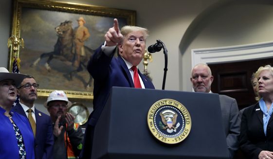 President Donald Trump delivers remarks on proposed changes to the National Environmental Policy Act, at the White House, Thursday, Jan. 9, 2020, in Washington. (AP Photo/ Evan Vucci)