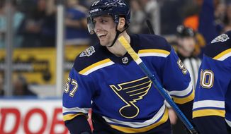 St. Louis Blues&#39; David Perron celebrates after scoring during the second period of an NHL hockey game against the Buffalo Sabres, Thursday, Jan. 9, 2020, in St. Louis. (AP Photo/Jeff Roberson)
