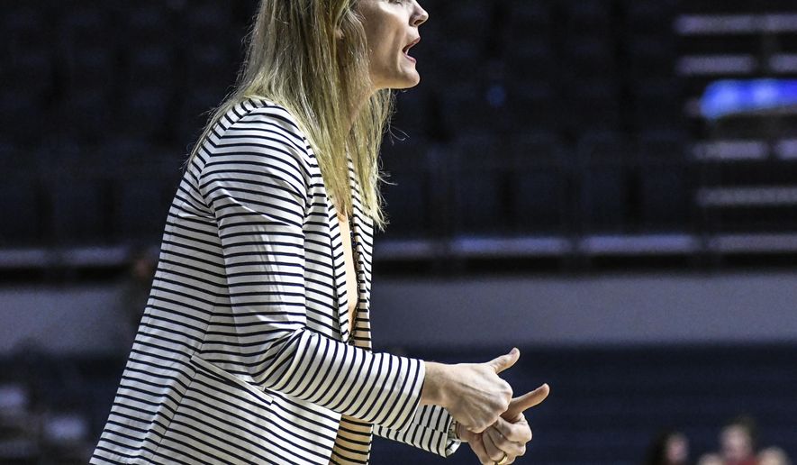 Tennessee head coach Kellie Harper gives instructions against Mississippi during an NCAA college basketball game in Oxford, Miss., Thursday, Jan. 9, 2020. (Bruce Newman/The Oxford Eagle via AP)