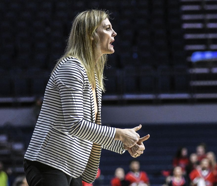 Tennessee head coach Kellie Harper gives instructions against Mississippi during an NCAA college basketball game in Oxford, Miss., Thursday, Jan. 9, 2020. (Bruce Newman/The Oxford Eagle via AP)