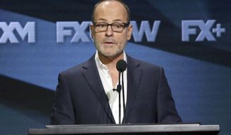 FILE - In this Aug. 3, 2018, file photo, John Landgraf, CEO, FX Networks and FX Productions, participates in the executive panel during the FX Television Critics Association Summer Press Tour in Beverly Hills, Calif.  (Photo by Willy Sanjuan/Invision/AP, File)