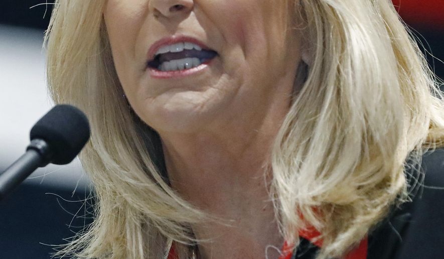 FILE - In this Oct. 31, 2019 photograph, current state auditor Lynn Fitch, spells out her campaign platform at the Mississippi Economic Council's annual "Hobnob Mississippi," in Jackson, Miss. Fitch will be sworn in as Mississippi's new attorney general Thursday, Jan. 9, 2020, thus becoming the first woman in that job.(AP Photo/Rogelio V. Solis, File)