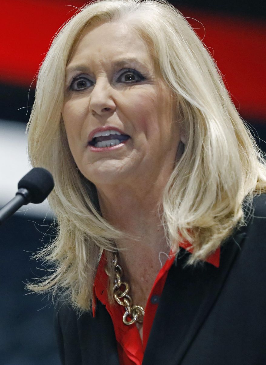 FILE - In this Oct. 31, 2019 photograph, current state auditor Lynn Fitch, spells out her campaign platform at the Mississippi Economic Council's annual "Hobnob Mississippi," in Jackson, Miss. Fitch will be sworn in as Mississippi's new attorney general Thursday, Jan. 9, 2020, thus becoming the first woman in that job.(AP Photo/Rogelio V. Solis, File)