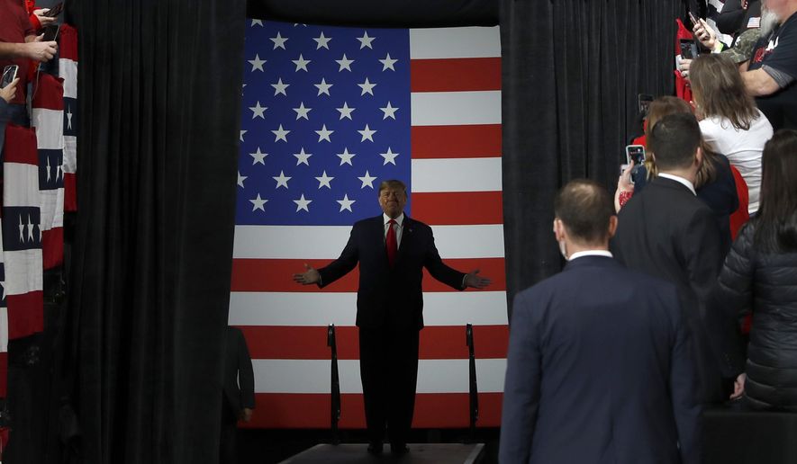 President Donald Trump arrives for a campaign rally, Thursday, Jan. 9, 2020, in Toledo, Ohio. (AP Photo/ Jacquelyn Martin)