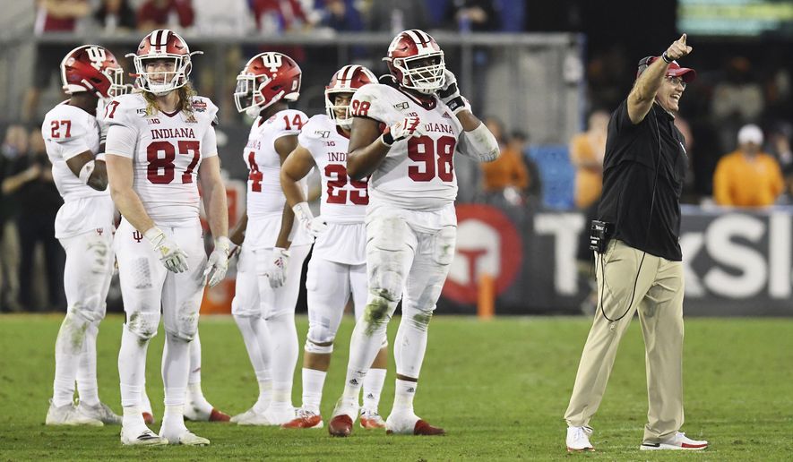 Indiana coach Tom Allen argues with officials about the onside kick by Tennessee late in the fourth quarter of the Gator Bowl NCAA college football game Thursday, Jan. 2, 2020, in Jacksonville, Fla. Tennessee recovered the kick. (Bob Self/The Florida Times-Union via AP)