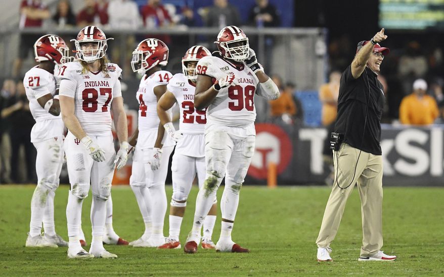 Indiana coach Tom Allen argues with officials about the onside kick by Tennessee late in the fourth quarter of the Gator Bowl NCAA college football game Thursday, Jan. 2, 2020, in Jacksonville, Fla. Tennessee recovered the kick. (Bob Self/The Florida Times-Union via AP)
