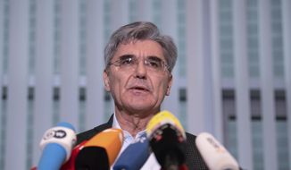 Joe Kaeser, CEO of Siemens, addresses the media during a statement in Berlin, Germany, Friday. Jan. 10, 2020. Kaeser met German representatives of the Fridays-for-Future movement and said the company takes the activists&#39; concerns seriously. (Soeren Stache/dpa via AP)