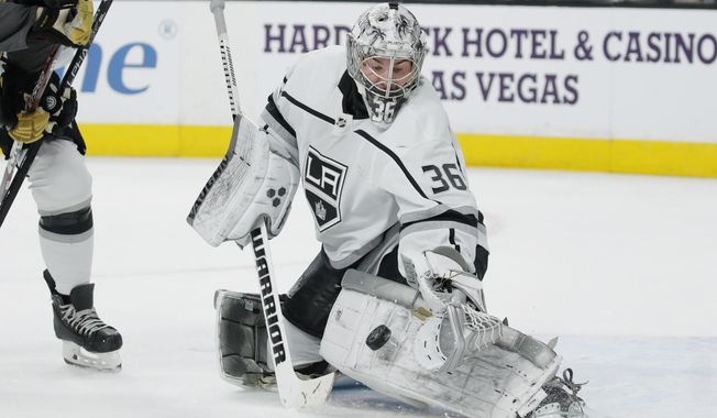 Los Angeles Kings goaltender Jack Campbell (36) blocks a shot by the Vegas Golden Knights during the second period of an NHL hockey game Thursday, Jan. 9, 2020, in Las Vegas. (AP Photo/John Locher)
