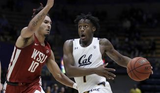 California&#39;s Joel Brown, right, drives the ball against Washington State&#39;s Isaac Bonton (10) during the second half of an NCAA college basketball game Thursday, Jan. 9, 2020, in Berkeley, Calif. (AP Photo/Ben Margot)