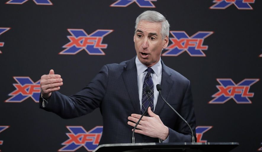 In this Feb. 25, 2019, file photo, XFL Commissioner Oliver Luck gestures during a press conference in Seattle.   (AP Photo/Ted S. Warren) ** FILE **