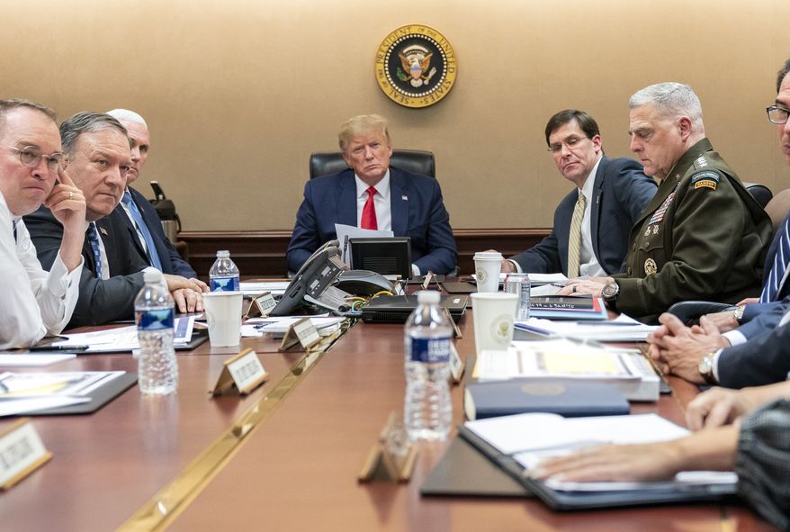 In this image released by the White House, President Donald Trump, joined by Vice President Mike Pence, meets with senior White House advisors Tuesday evening, Jan. 7, 2020, in the Situation Room of the White House in Washington.(Shealah Craighead/White House via AP)