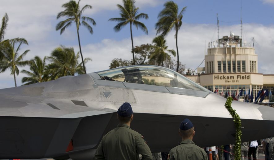 A F-22 Raptor is seen after a ceremony welcoming the jets at Joint Base Pearl Harbor-Hickham Friday, July 9, 2010, in Honolulu. The jets will be part of the Hawaii Air National Guard. (AP Photo/Marco Garcia)