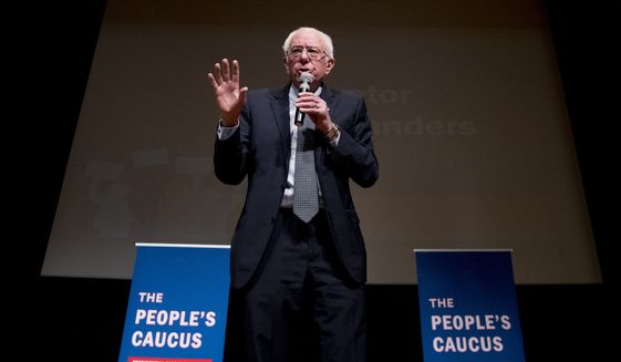Democratic presidential candidate Sen. Bernie Sanders, I-Vt., speaks at &quot;The People&#39;s Caucus: Vote Truth to Power&quot; at the Holzworth Performing Arts Center at Davenport North High School, Sunday, Jan. 12, 2020, in Davenport, Iowa. (AP Photo/Andrew Harnik)