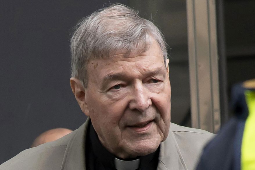 FILE - In this Feb. 26, 2019, file photo, Cardinal George Pell arrives at the County Court in Melbourne, Australia. A newspaper reports that Pell has been transferred from a Melbourne prison after a drone illegally flew overhead in a suspected attempt to photograph the famous inmate. (AP Photo/Andy Brownbill, File)