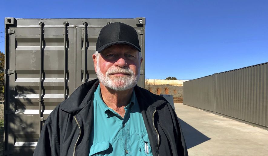 In this Dec. 30, 2019, file photo, Jack Wilson, poses for a photo at a firing range outside his home in Granbury, Texas. Gov. Greg Abbott of Texas presented the state's highest civilian honor, the Governor's Medal of Courage, to Wilson, who shot and killed a gunman who opened fire at a church in December, on Monday, Jan. 13, 2020. (AP Photo/Jake Bleiberg File)