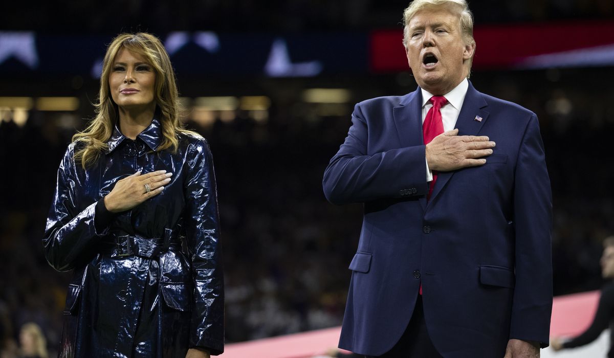 Trump, first lady cheered at National Championship game
