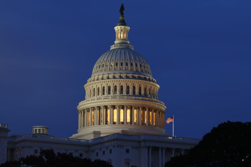 FILE - This July 16, 2019, file photo shows the Capitol Dome in Washington. The U.S. budget deficit through the first three months of this budget year is up 11.8% from the same period a year ago, putting the country on track to record its first $1 trillion deficit in eight years. The Treasury Department said Monday, Jan. 13, 2020, that the deficit from October through December totaled $356.6 billion. (AP Photo/Carolyn Kaster, File)