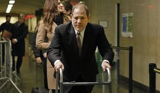 Harvey Weinstein arrives for jury selection in his trial on rape and sexual assault charges, in New York, Tuesday,  Jan. 14, 2020. (AP Photo/Richard Drew)