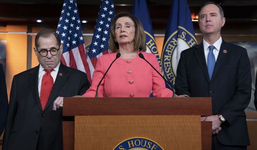 Speaker of the House Nancy Pelosi, D-Calif., flanked by House Judiciary Committee Chairman, Rep. Jerrold Nadler, D-N.Y., left, and House Intelligence Committee Chairman Adam Schiff, D-Calif., as he speaks during a news conference to announce impeachment managers at the Capitol in Washington, Wednesday, Jan. 15, 2020. (AP Photo/J. Scott Applewhite)